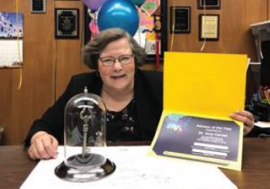 Dr. Amy Carrell posing with award.