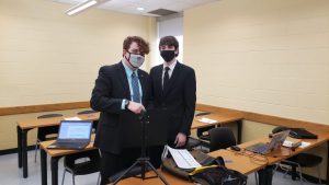 Pictured to the right, Joshua Reynolds (Freshman), and P.J. Taylor (Freshman) get ready to compete at the University of Wyoming Invitational Online.