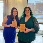 UCO students pose with awards