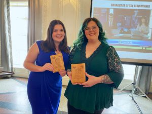 UCO students pose with awards