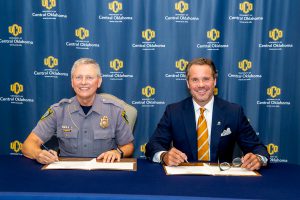  UCO President Todd G. Lamb and OKCPD Police Chief Wade Gourley.
